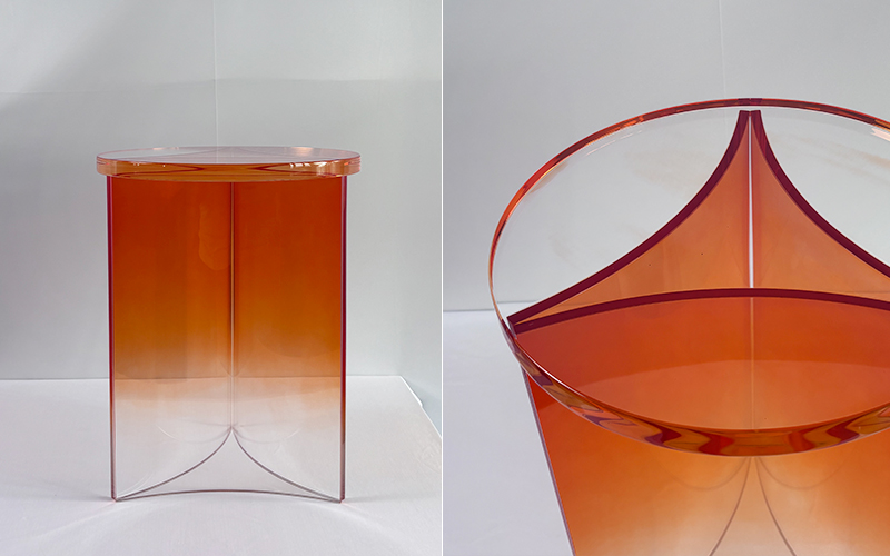 Finished gradient orange acrylic round side table and curved furniture, minimalist white studio product shot