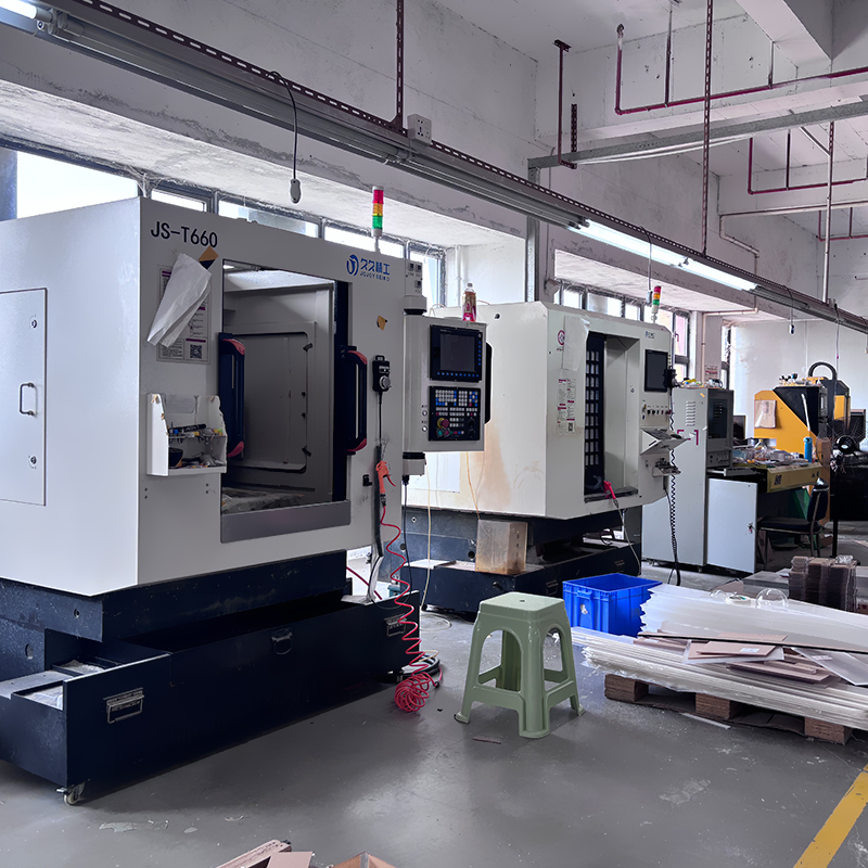 Factory workshop with multiple CNC acrylic cutting machining equipment