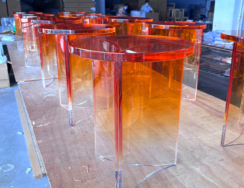 Batch-production-of-custom-amber-translucent-acrylic-side-tables,-high-clarity-lucite-furniture-OEM-factory.