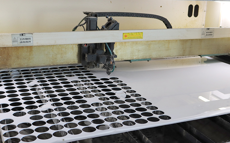 CNC Routing of Circular Patterns on White Acrylic, Perforation