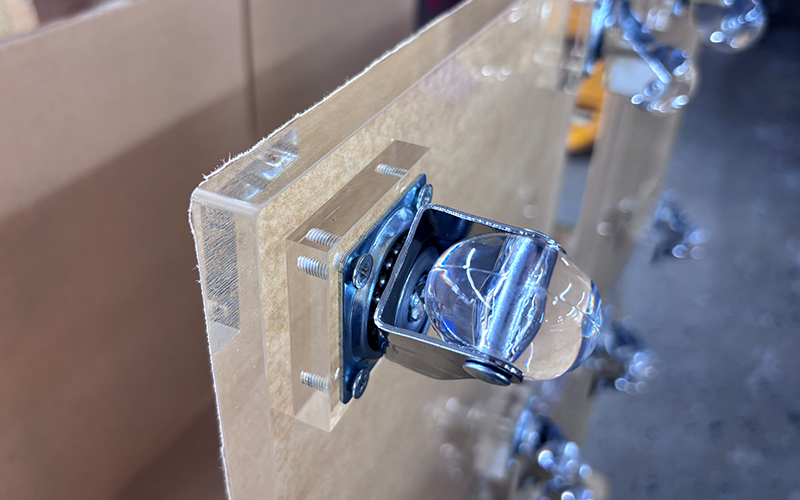 Detail-of-heavy-duty-hardware-integration-on-25mm-thick-clear-acrylic-panel.