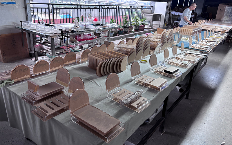 Large-scale workshop for wholesale acrylic furniture, high-capacity batch production of clear lucite C-tables and custom OEM orders.