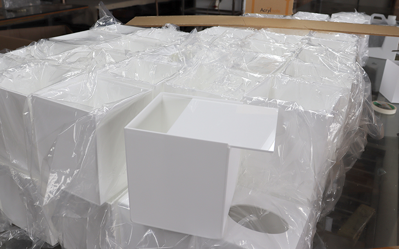 Protective film and secure packaging for export-quality acrylic products