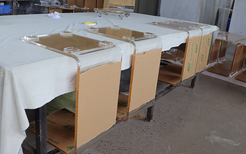 Rows-of-finished-acrylic-nesting-tables-waiting-for-final-quality-control-(QC).