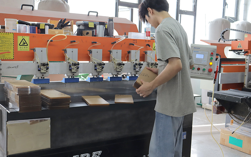 Skilled operator managing automated polishing lines for large-scale export orders.