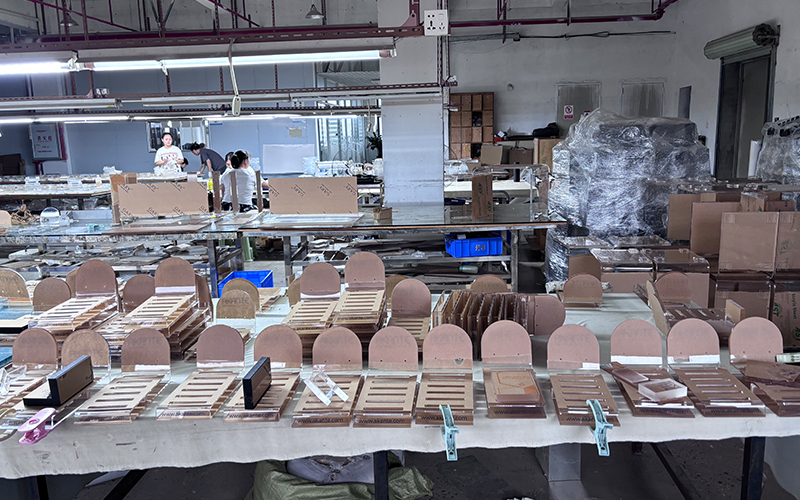 Source manufacturer for bespoke acrylic components, organized batch processing of clear heavy-gauge lucite furniture parts in China factory.