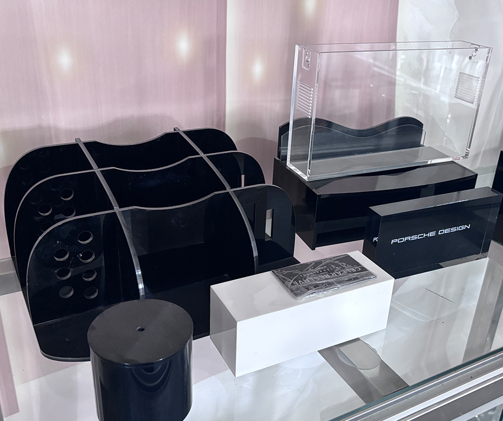 Black and Clear Acrylic Display Fixtures with a Transparent Product Case