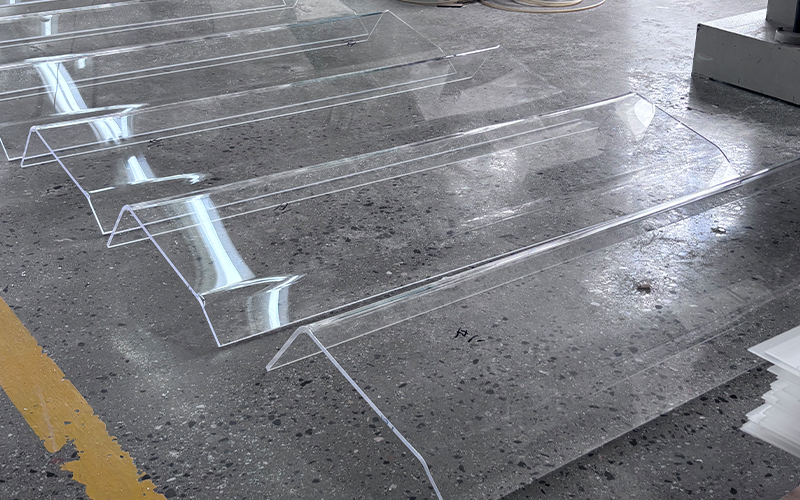 Formed Clear Acrylic Strips and Channels Prepared for Custom Display Assembly
