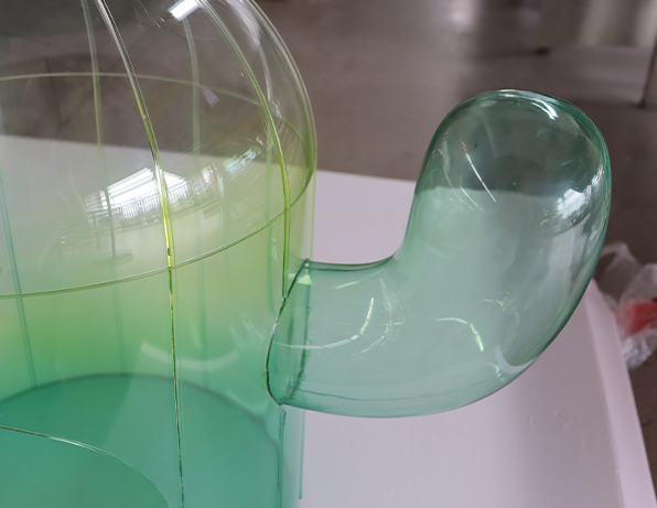 Green Transparent Acrylic Cat Tunnel Attached to a Curved Pet Enclosure