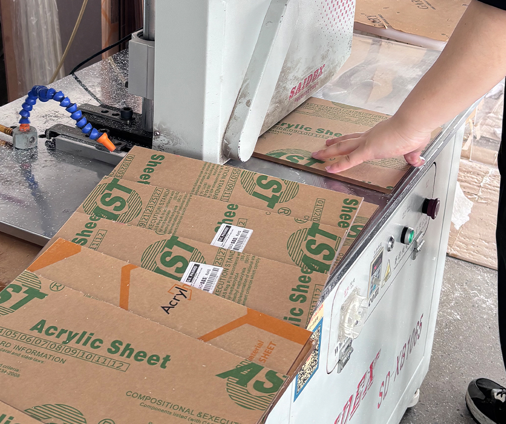 Industrial Cutting of a Protective-film-covered Acrylic Sheet in a Factory