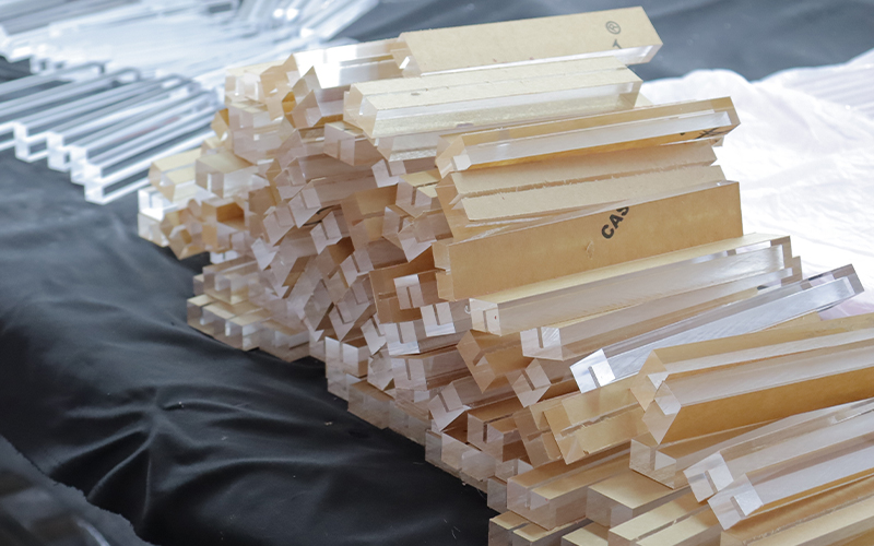 Stacked Clear and Amber Acrylic Rods for Custom Furniture Fabrication