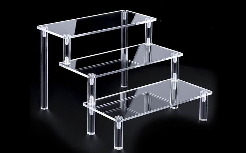 Three-tier Clear Acrylic Display Riser with Cylindrical Support Posts and Removable Shelves