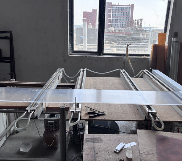Acrylic sheet cutting machine in furniture workshop (2)