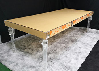 Beige coffee table with clear acrylic legs