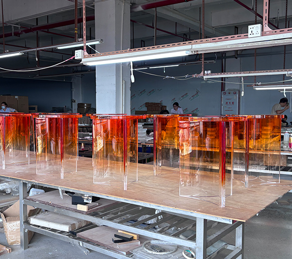 Bulk acrylic furniture production in factory workshop