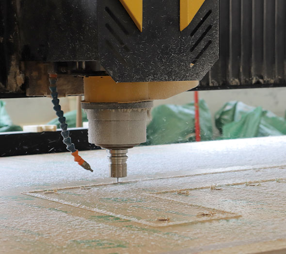 CNC router cutting acrylic furniture panels