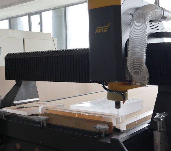 CNC router cutting acrylic sheets for furniture production