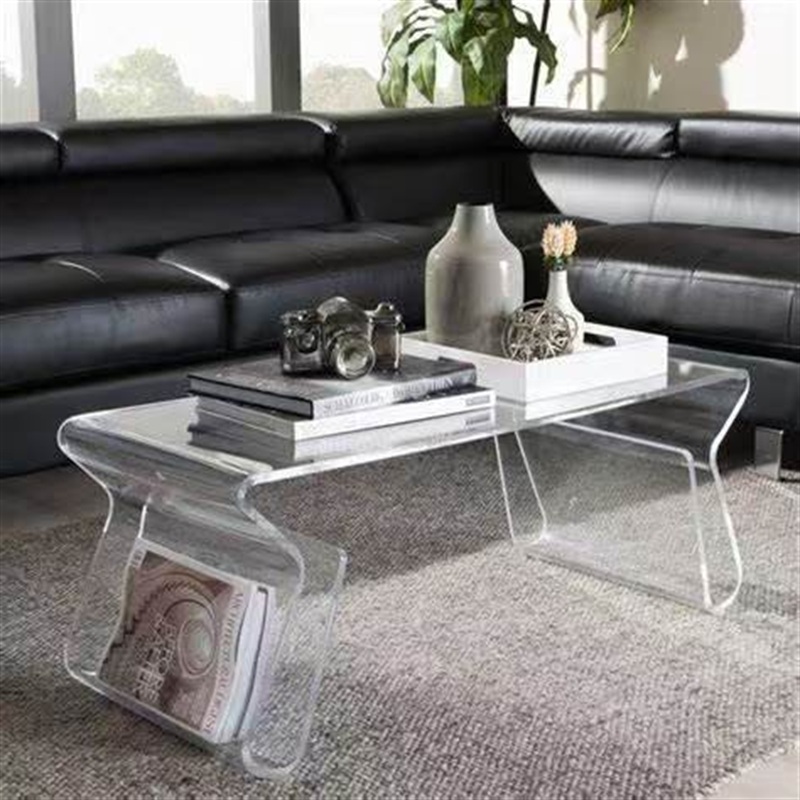 Clear acrylic bent waterfall coffee table with magazine rack