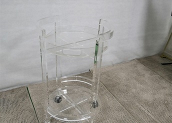 Clear acrylic round service trolley with wheels