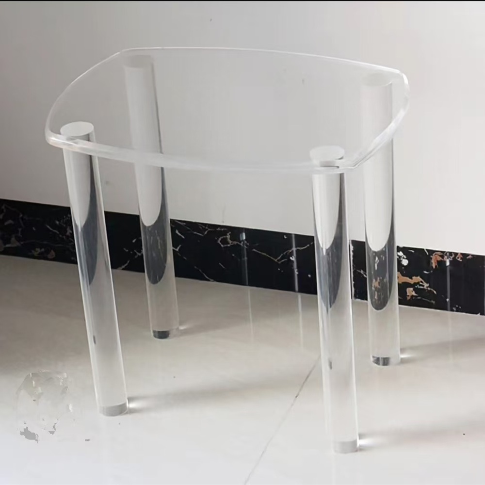 Clear acrylic round side table with four legs