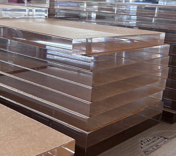 Clear acrylic sheets stacked for bulk supply, transparent plastic panels for wholesale fabrication