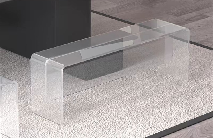 Clear acrylic waterfall bench with seamless curved edges