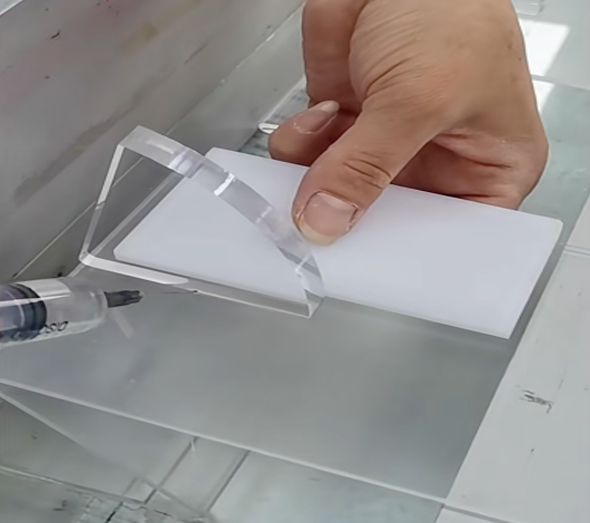 Custom-clear-acrylic-display-fixture-assembly-for-retail-and-commercial-applications