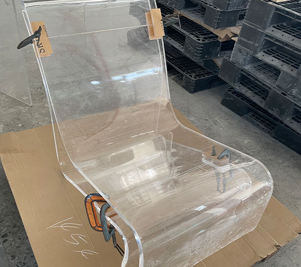 Custom clear acrylic lounge chair in production