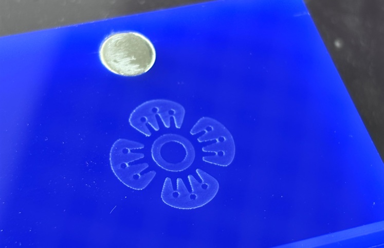 Custom engraved logo and magnet dot on blue acrylic mahjong rack