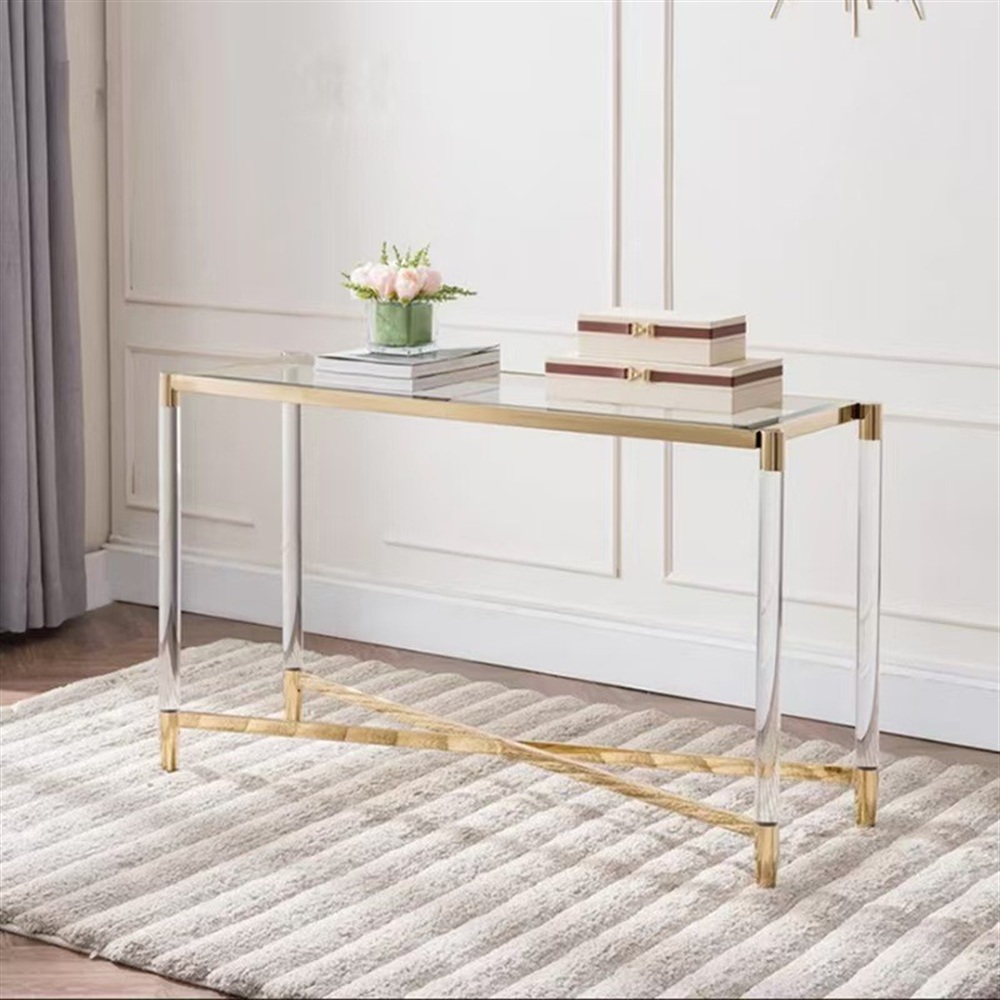 Glass console table with gold frame and clear acrylic legs