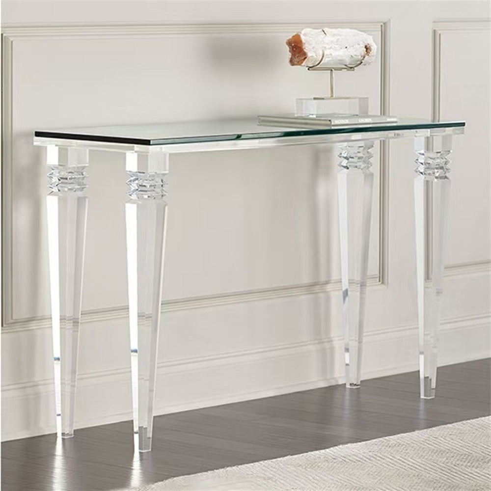 Glass top console table with faceted clear acrylic tapered legs