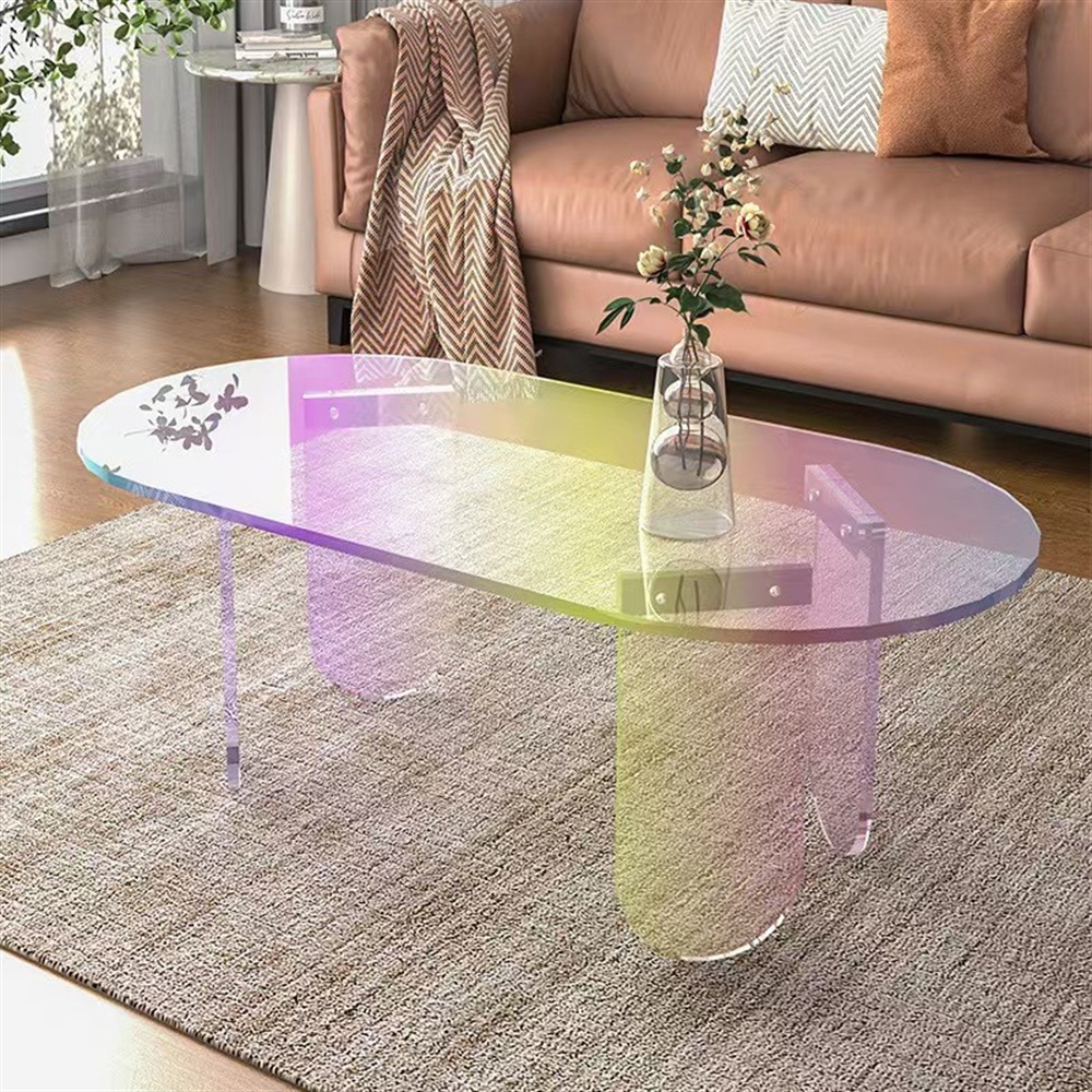 Iridescent acrylic oval coffee table with rainbow finish in living room