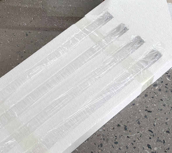 Packaged clear acrylic furniture components