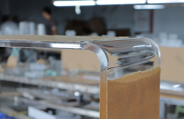 Polished clear acrylic furniture edge