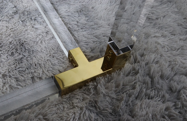Polished gold metal bracket connector for acrylic table base