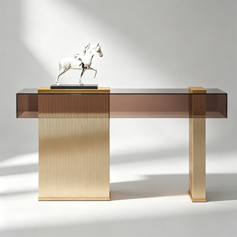 Smoked brown glass console table with fluted gold pedestals