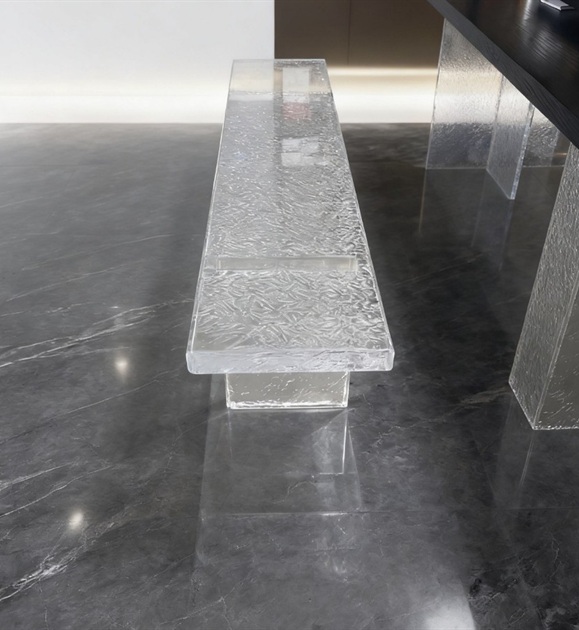 Textured ice cracked clear acrylic bench on marble floor