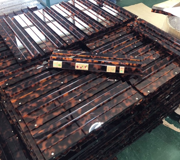 Tortoise shell acrylic mahjong racks in factory bulk production