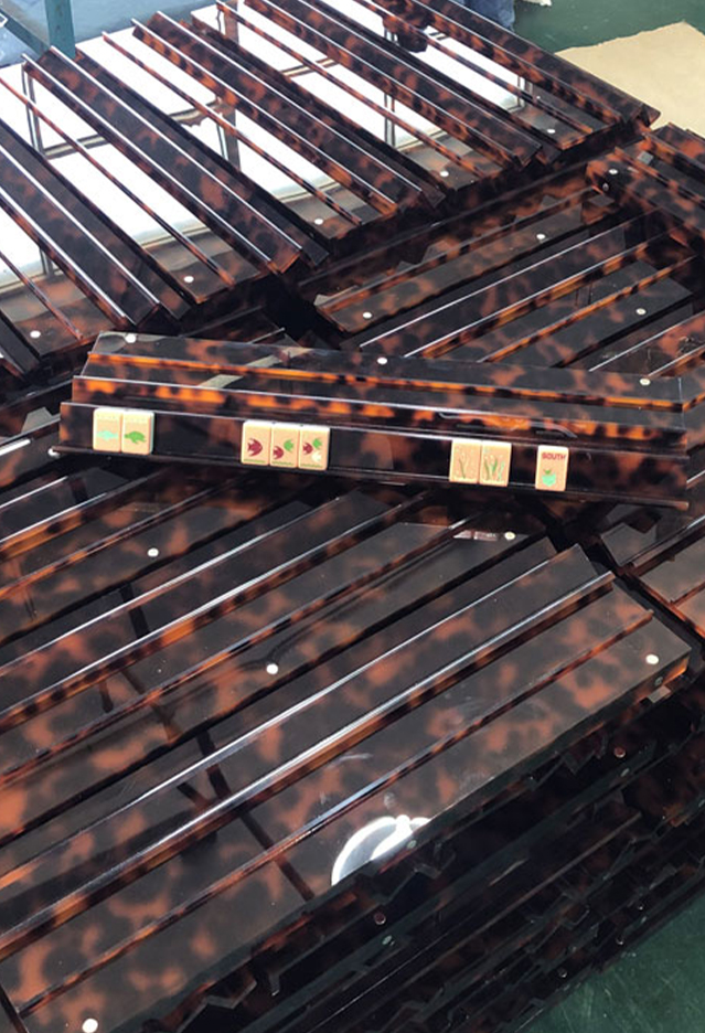 Tortoiseshell acrylic mahjong racks with pushers in bulk production