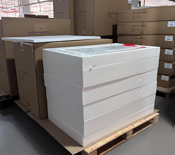 Wrapped acrylic table frame corner for safe bulk shipping