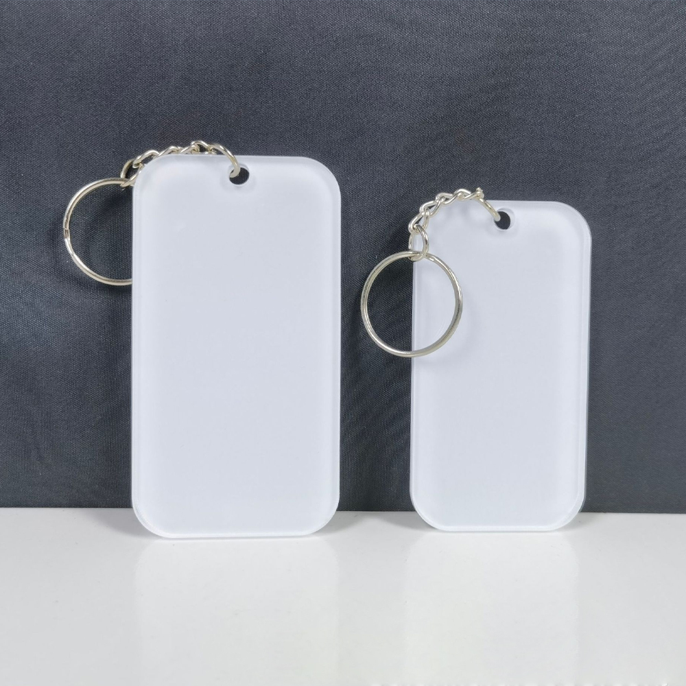 blank-frosted-acrylic-keychains-with-rounded-rectangle-shapes-and-metal-key-rings