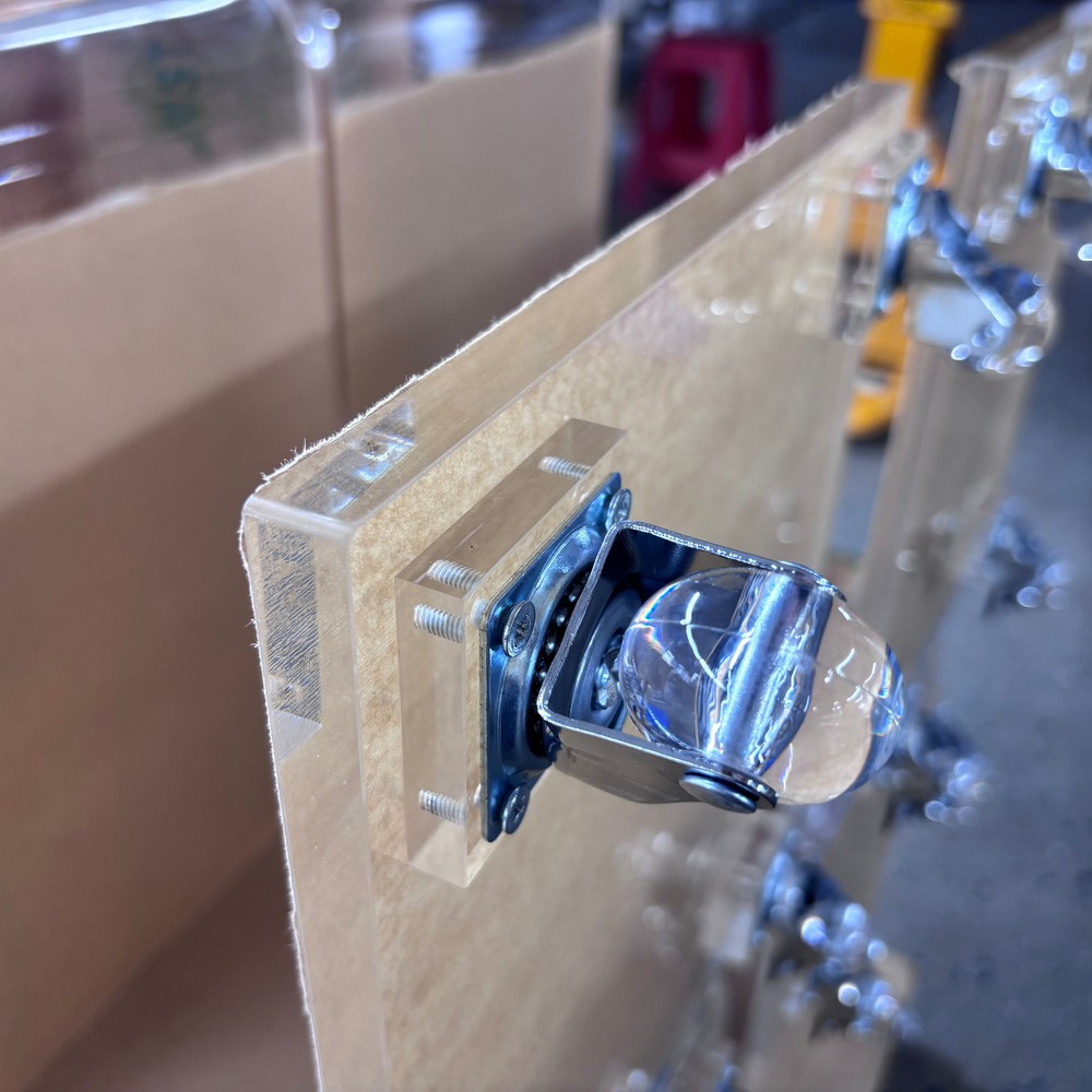 clear-acrylic-panel-with-chrome-caster