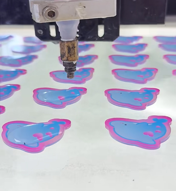 cnc-drilling-holes-in-colorful-bear-shaped-acrylic-keychain-blanks