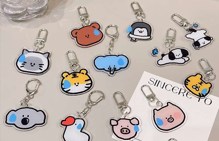 custom-cartoon-acrylic-keychains-in-various-shapes-and-sizes-with-metal-key-rings-and-lobster-clasps