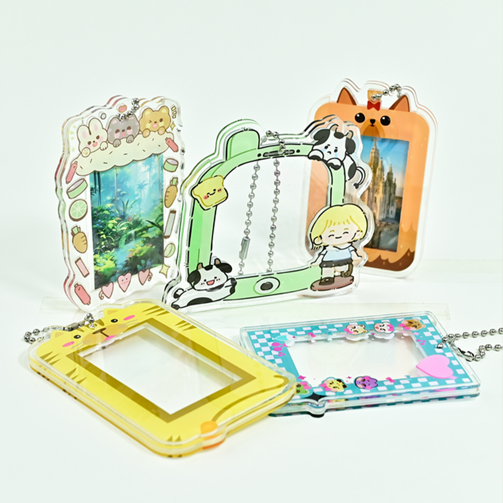 custom-laser-cut-acrylic-keychains-with-cartoon-frames-clear-windows-and-colorful-printed-designs