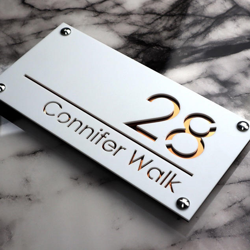 custom white acrylic door sign with cutout lettering and black standoff screws for confier walk