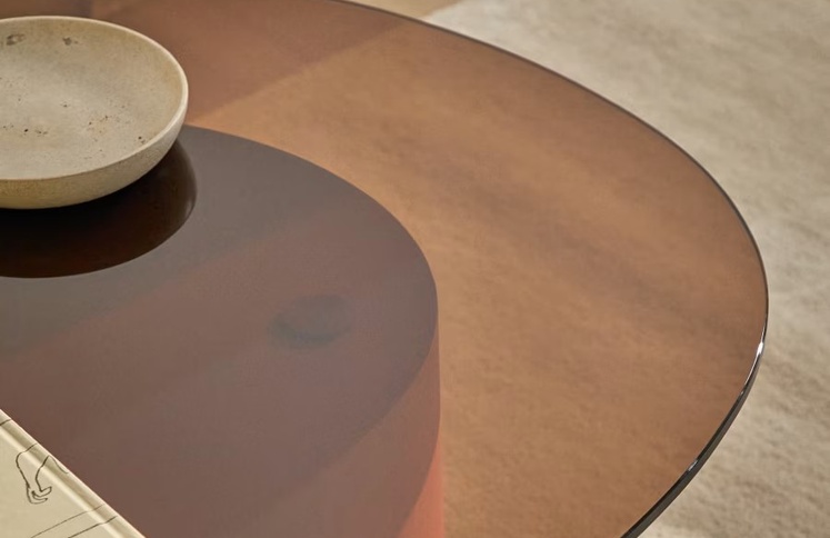 amber-tinted-glass-round-coffee-table-top-detail