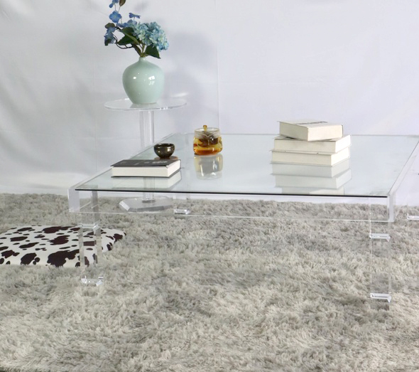 clear-acrylic-glass-top-coffee-table-tapered-legs-carpet