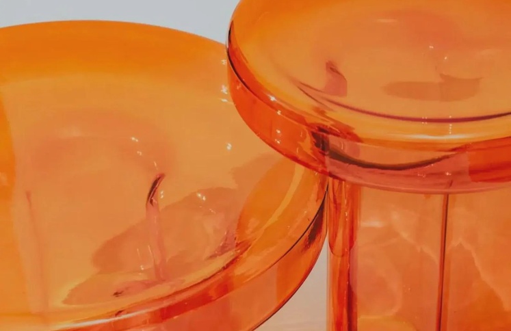 glossy-orange-acrylic-clover-pedestal-side-tables-detail
