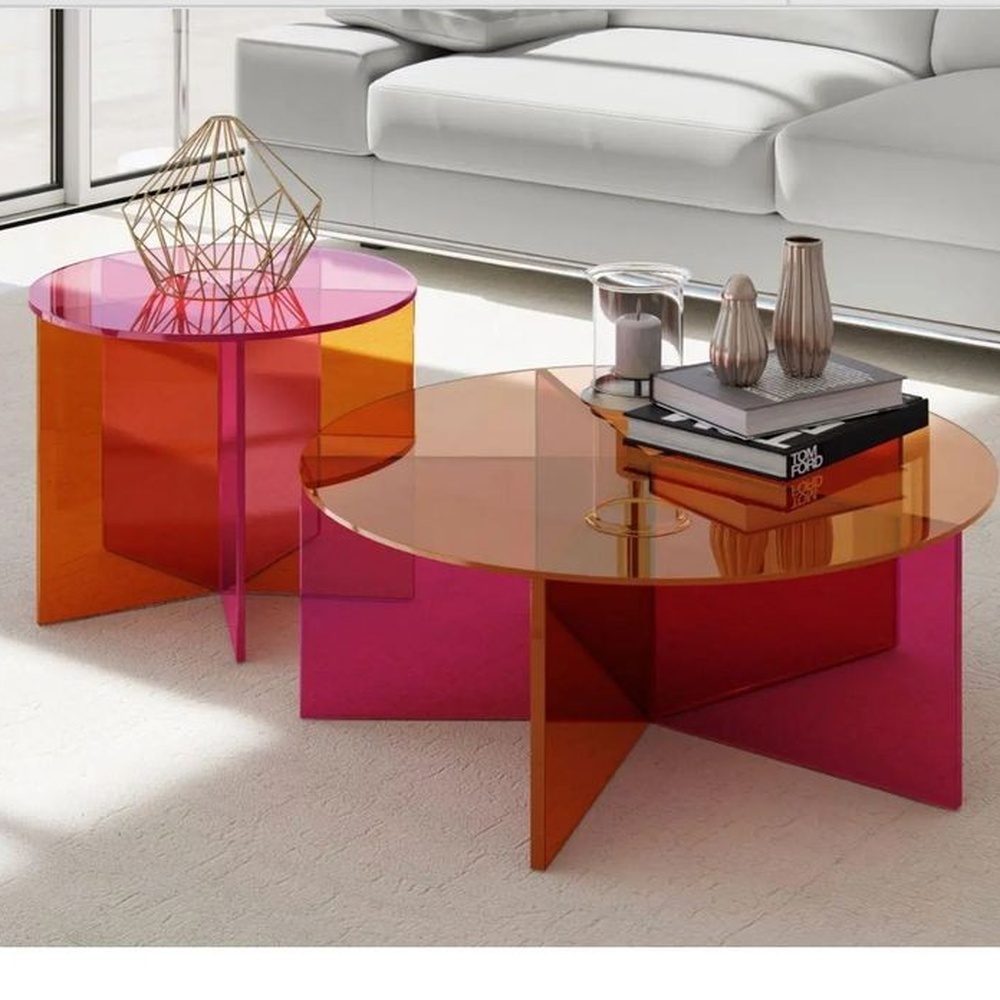 pink-orange-acrylic-round-nesting-coffee-tables-cross-base